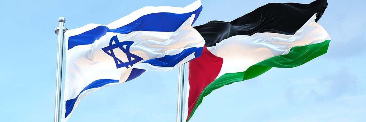 Flags of Israel and Palestine fly with a blue sky behind.